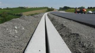 Herstellung Schlitzrinne mit Beton Gleitschalungsfertiger